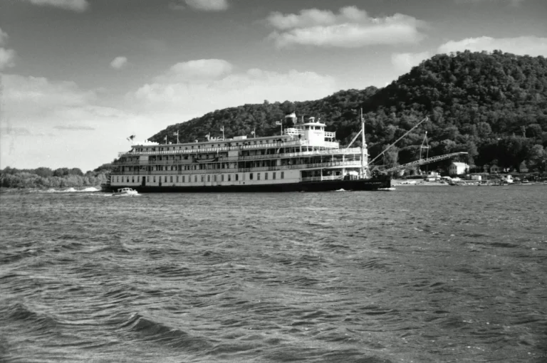 A 19th-century Mississippi riverboat at the dock, photographed in sepia
