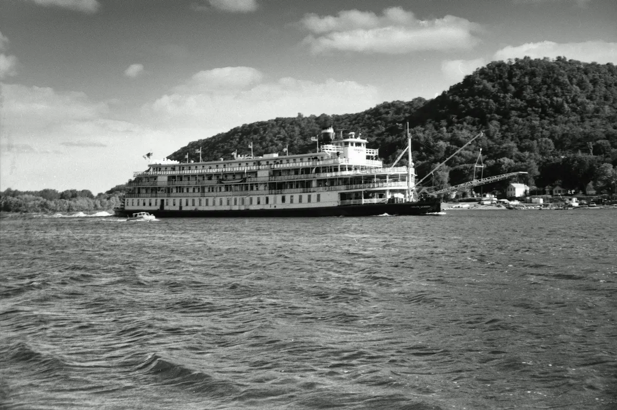A 19th-century Mississippi riverboat at the dock, photographed in sepia